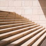 Last-mile Challenge - toddler's standing in front of beige concrete stair